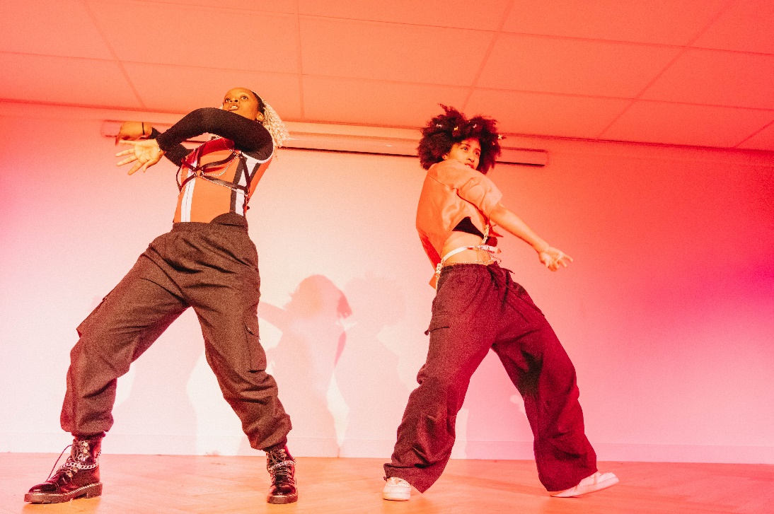 A person and person dancing

Description automatically generated with low confidence
