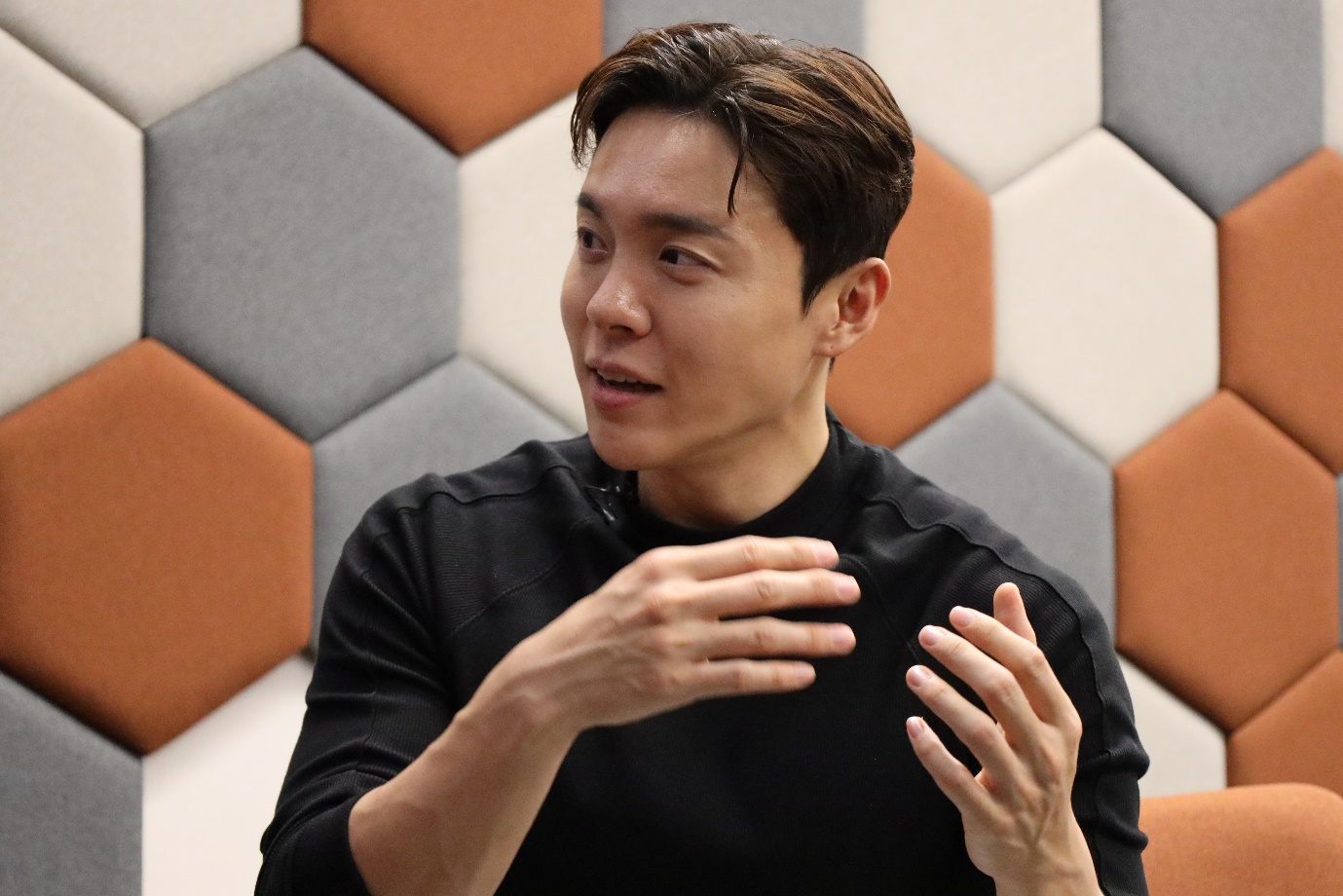 A person in black shirt
Description automatically generated