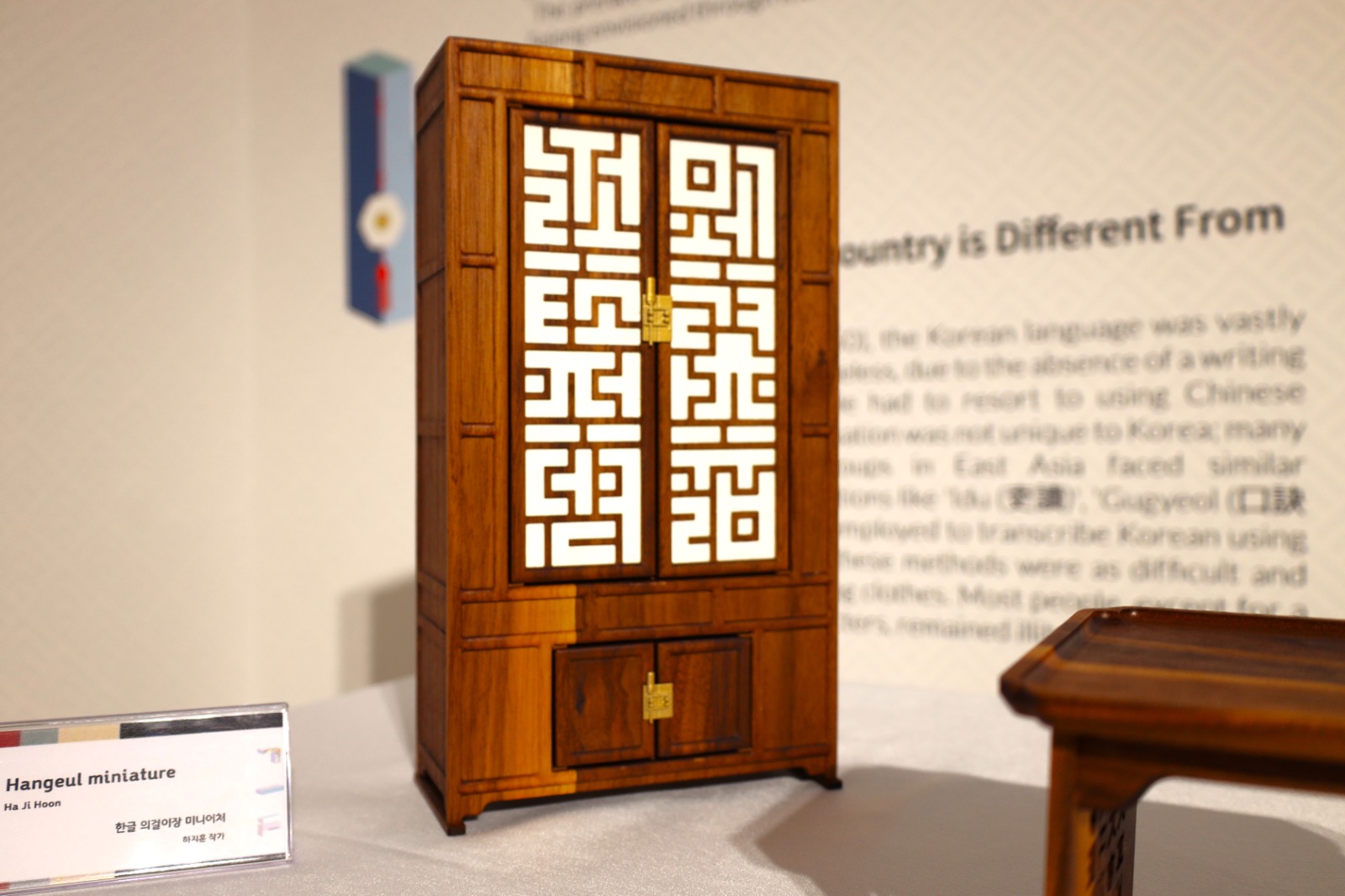 A wooden cabinet with a white screen

Description automatically generated with medium confidence