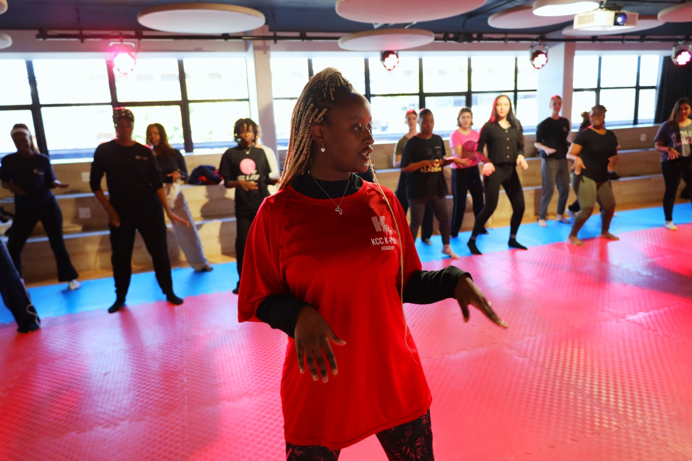 A group of people in a room
AI-generated content may be incorrect.