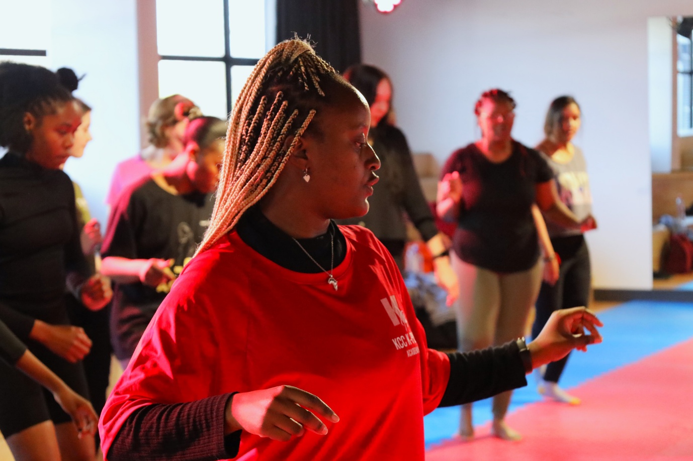 A group of people dancing
AI-generated content may be incorrect.