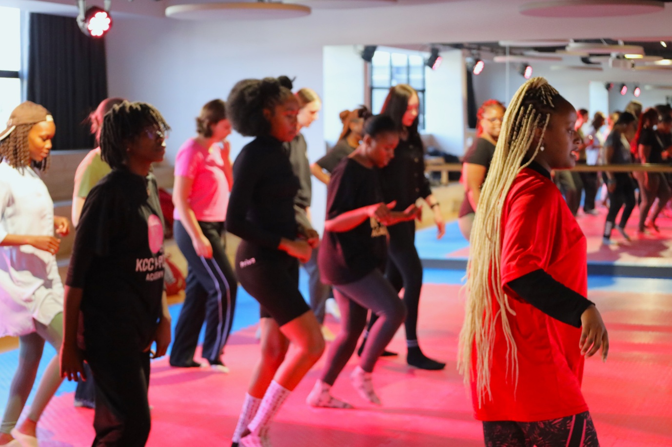 A group of people dancing
AI-generated content may be incorrect.