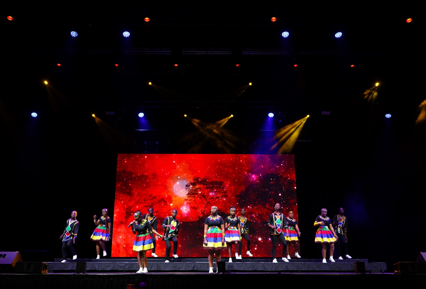 A group of people on a stage

AI-generated content may be incorrect.