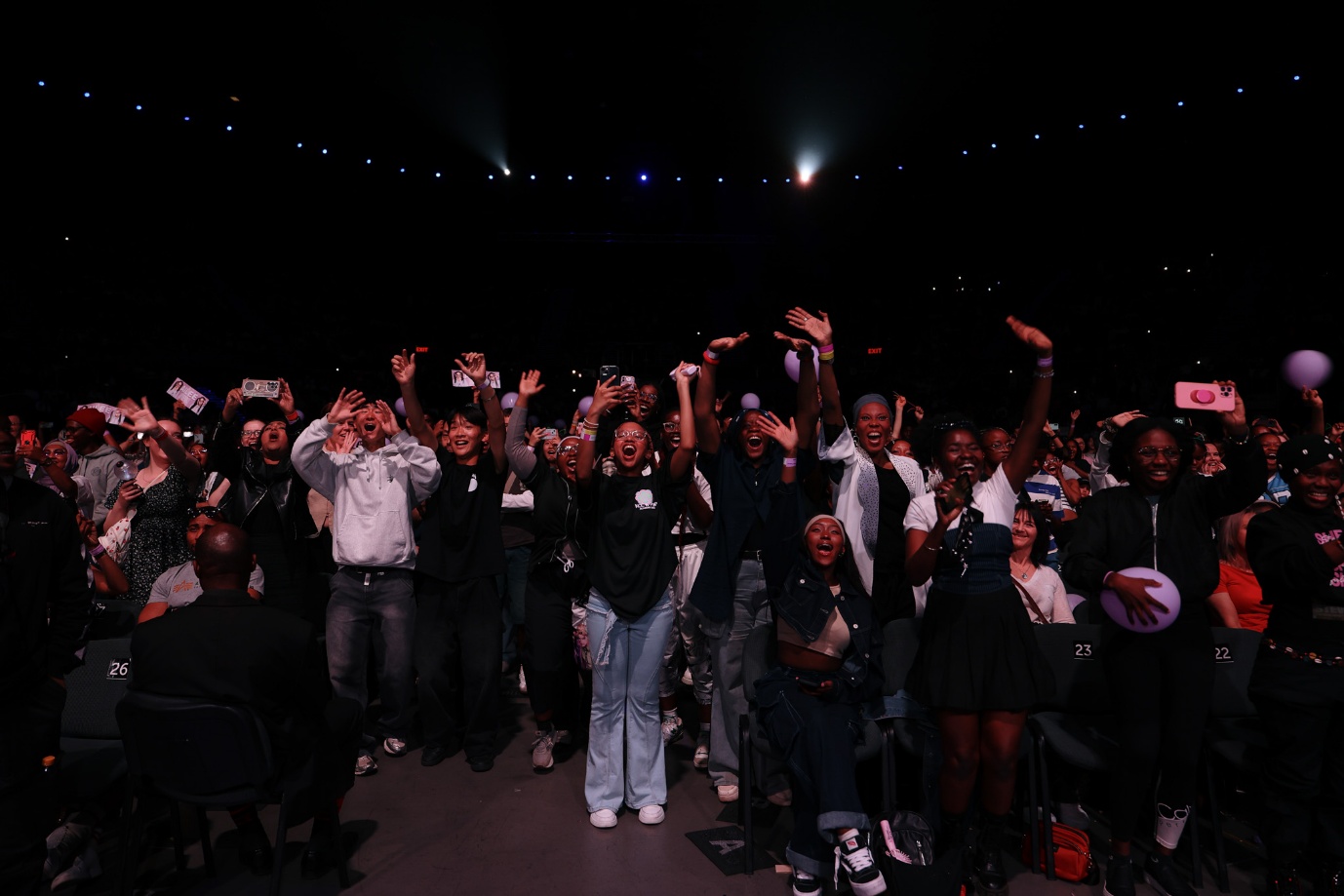 A group of people raising their hands

AI-generated content may be incorrect.