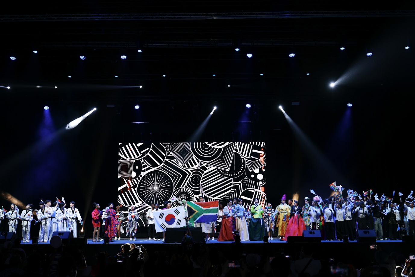 A group of people on a stage

AI-generated content may be incorrect.