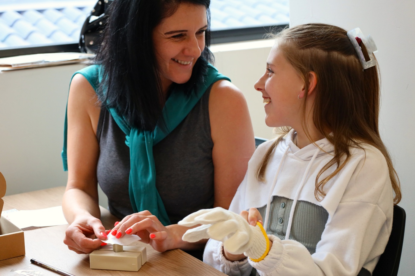 A person and a child smiling

AI-generated content may be incorrect.