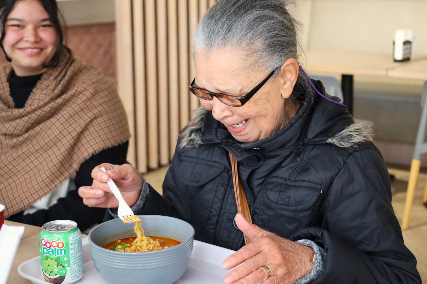 A person eating a bowl of soup

AI-generated content may be incorrect.