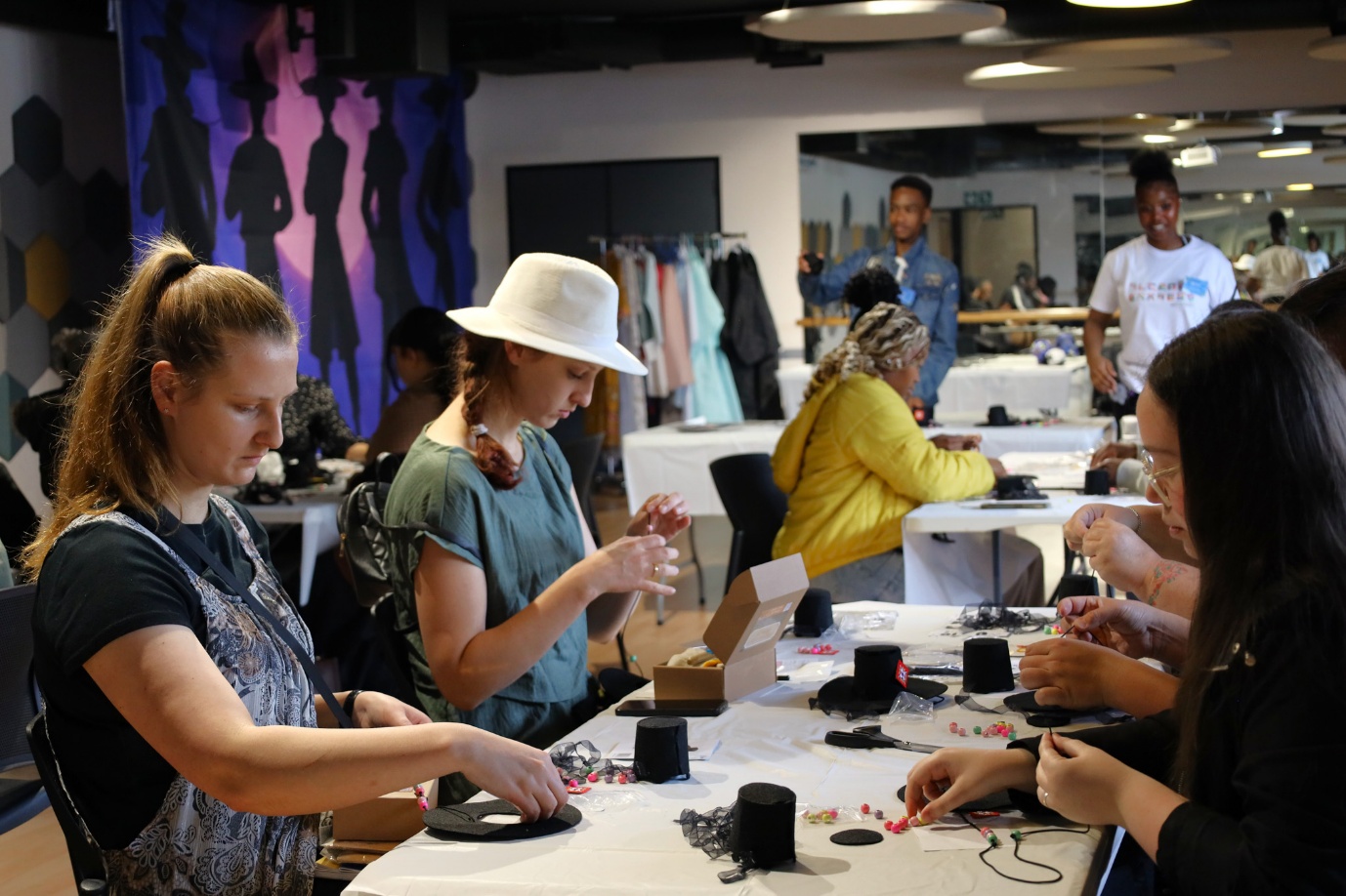 Several women working on a sewing project

AI-generated content may be incorrect.