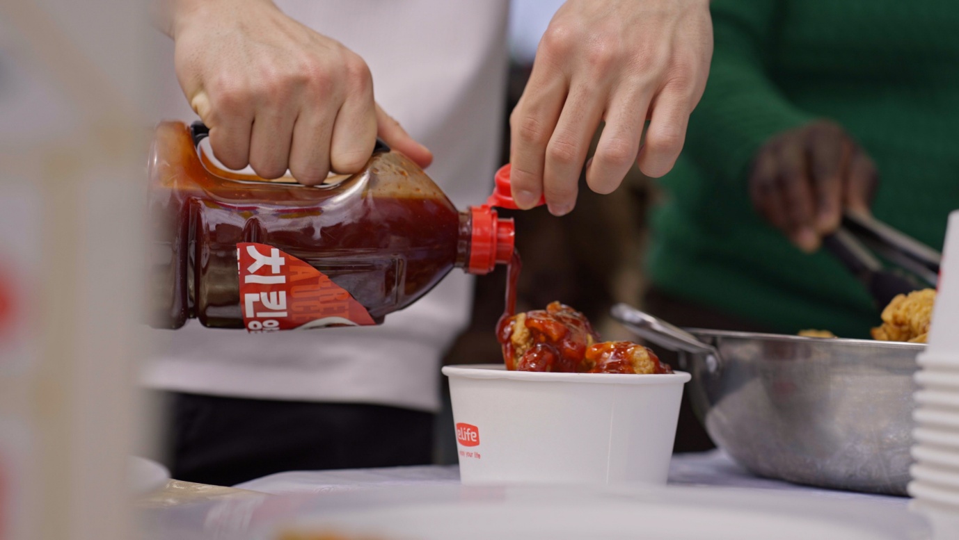 A person pouring a sauce into a bowl

AI-generated content may be incorrect.