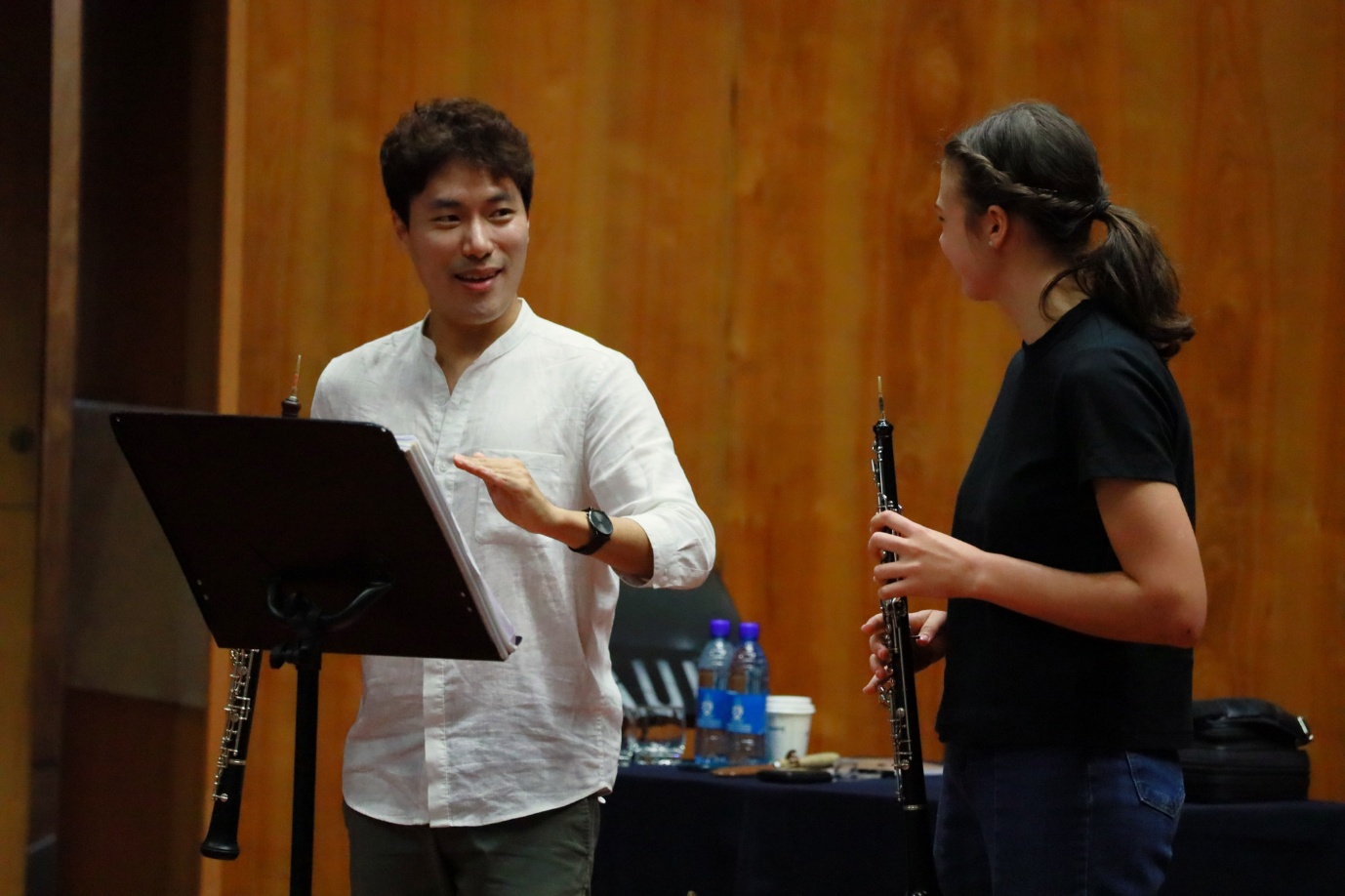 A person and person playing instruments

AI-generated content may be incorrect.